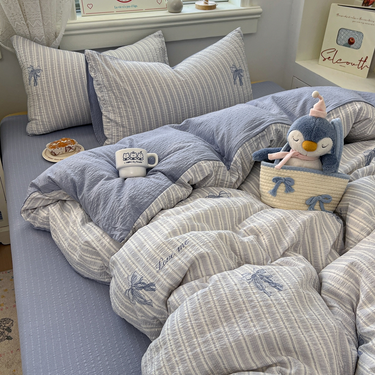 91家纺网 家纺一手货源 找家纺 暖伊家居 2026新款糖果小布袋泡芙纱四件套 海盐蝴蝶结