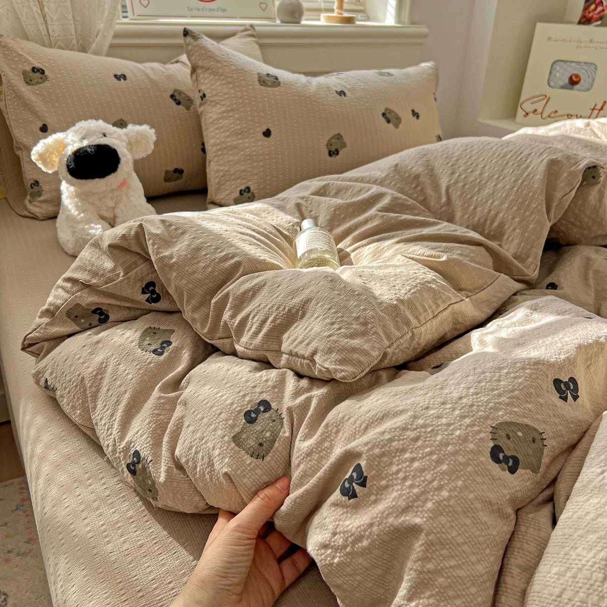 91家纺网 家纺一手货源 找家纺 暖伊家居 2026新款糖果小布袋泡芙纱四件套 黑皮KT