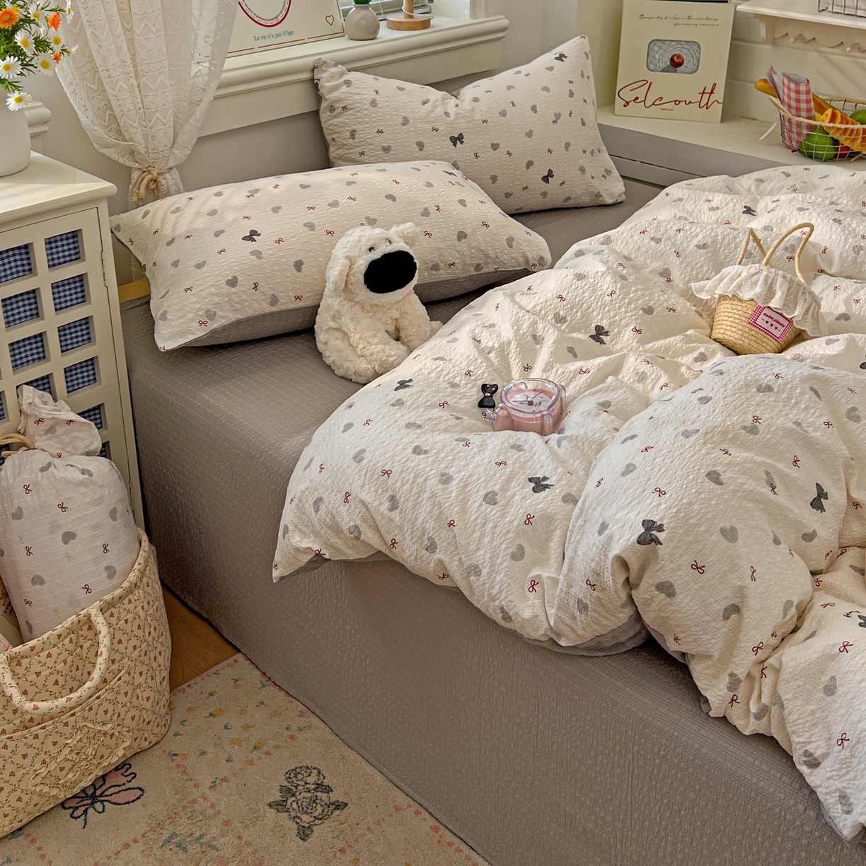 91家纺网 家纺一手货源 找家纺 暖伊家居 2026新款糖果小布袋泡芙纱四件套 简约巴恩