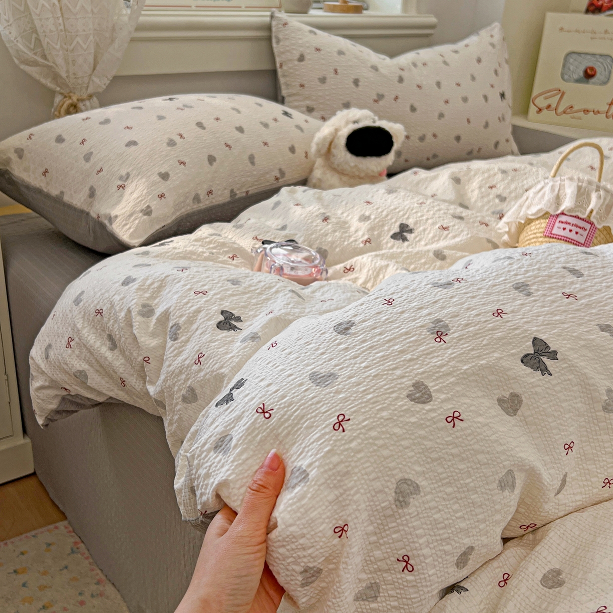 91家纺网 家纺一手货源 找家纺 暖伊家居 2026新款糖果小布袋泡芙纱四件套 简约巴恩