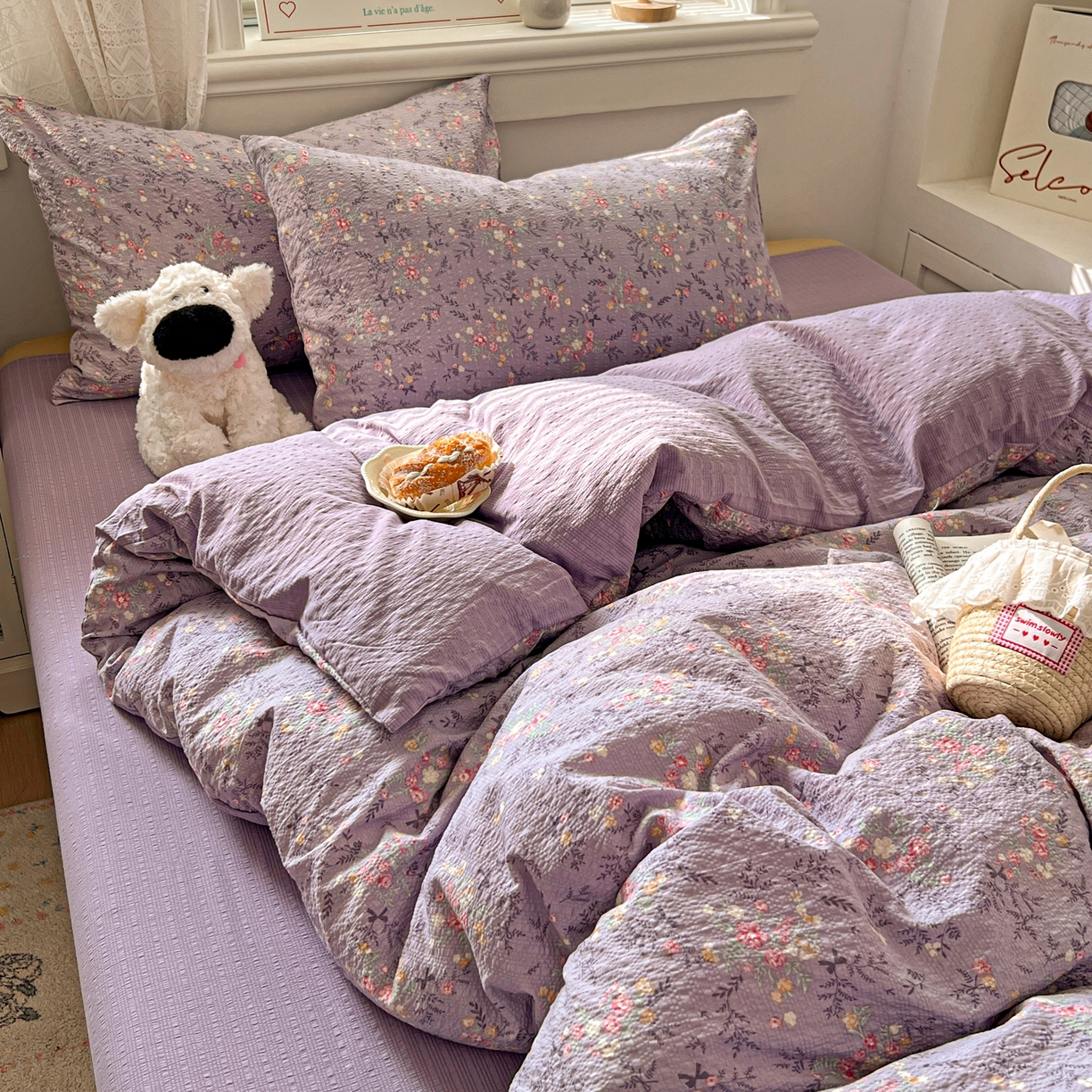 91家纺网 家纺一手货源 找家纺 暖伊家居 2026新款糖果小布袋泡芙纱四件套 薰衣紫花