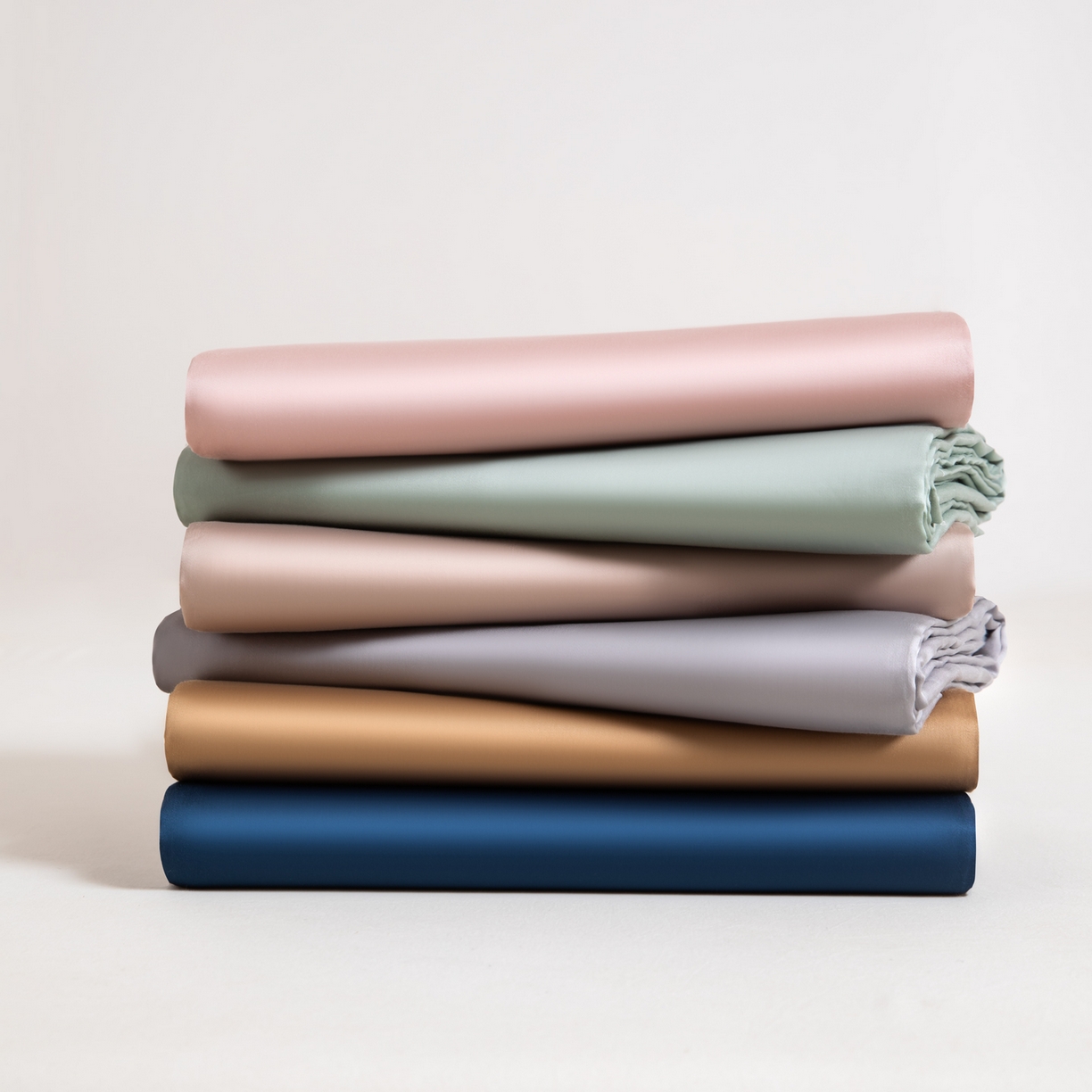 91家纺网 家纺一手货源 找家纺 眠博士 2026新款60S天丝莱赛尔纯色床笠-场景一 叠拍组合图-60S天丝