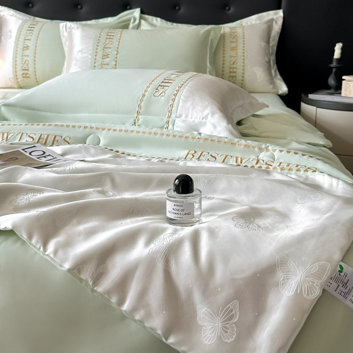 91家纺网 家纺一手货源 找家纺 绘萱家居 2026爆款莱赛冰丝绣花拼接提花水洗天丝夏被四件套水洗真丝夏被夏凉被空调被 蝶舞纷飞-绿