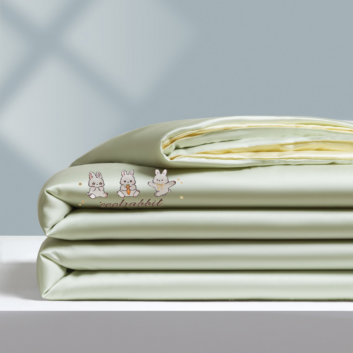 91家纺网 家纺一手货源 找家纺 云棉坊 2026新款水洗真丝冰丝刺绣夏被四件套-卡通款 乖乖兔-果绿+奶黄