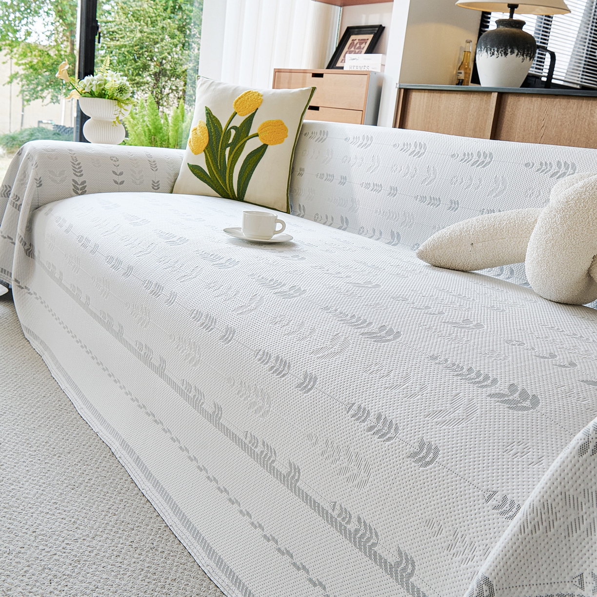 91家纺网 家纺一手货源 找家纺 卡初家居（原微来） 2026新款PE凉感冰丝沙发盖毯沙发巾系列 木槿-灰