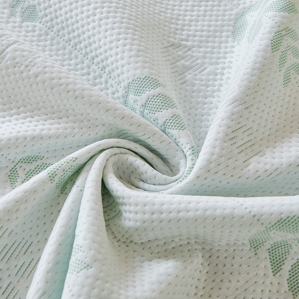 91家纺网 家纺一手货源 找家纺 卡初家居（原微来） 2026新款PE凉感冰丝沙发盖毯沙发巾系列 木槿-绿