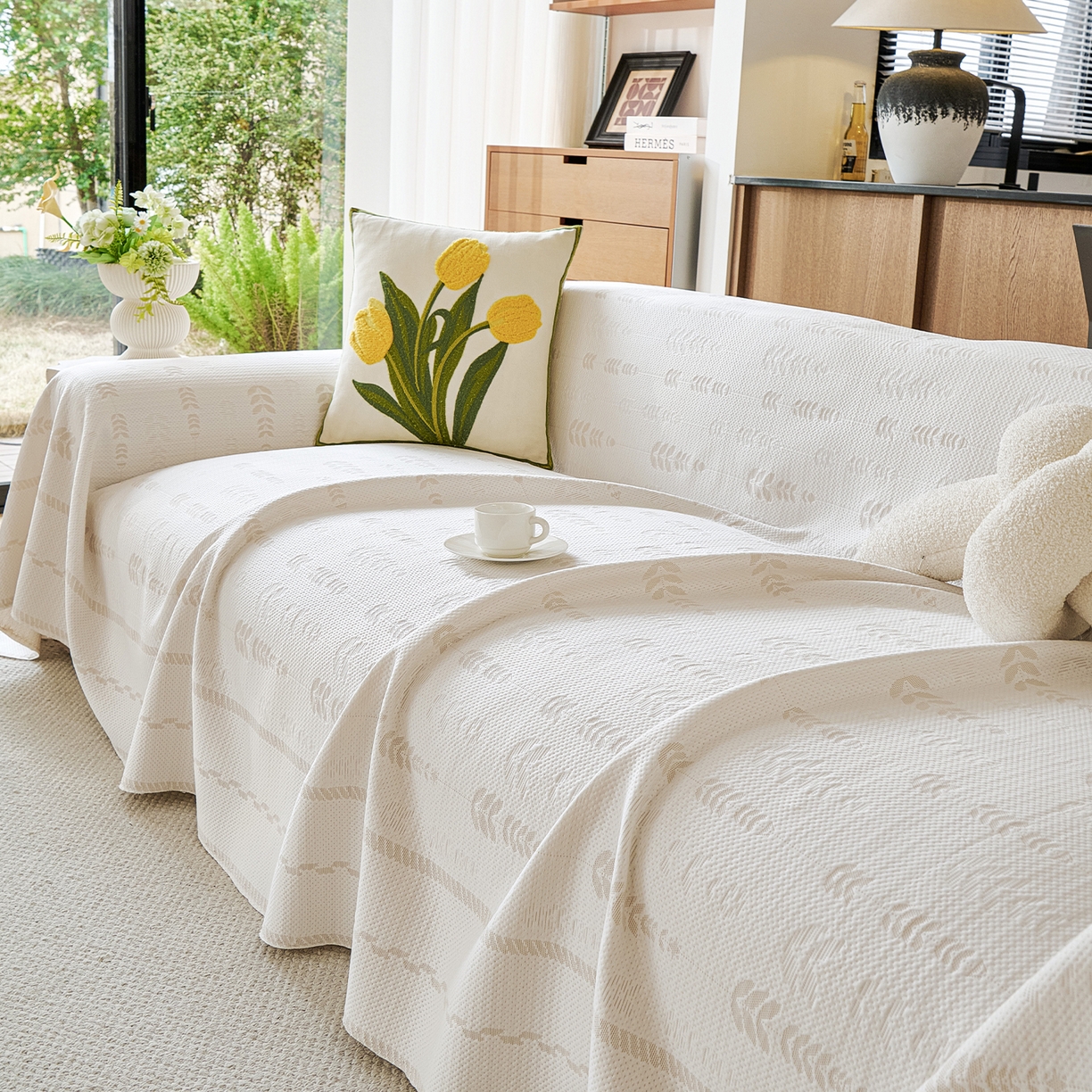 91家纺网 家纺一手货源 找家纺 卡初家居（原微来） 2026新款PE凉感冰丝沙发盖毯沙发巾系列 木槿-米