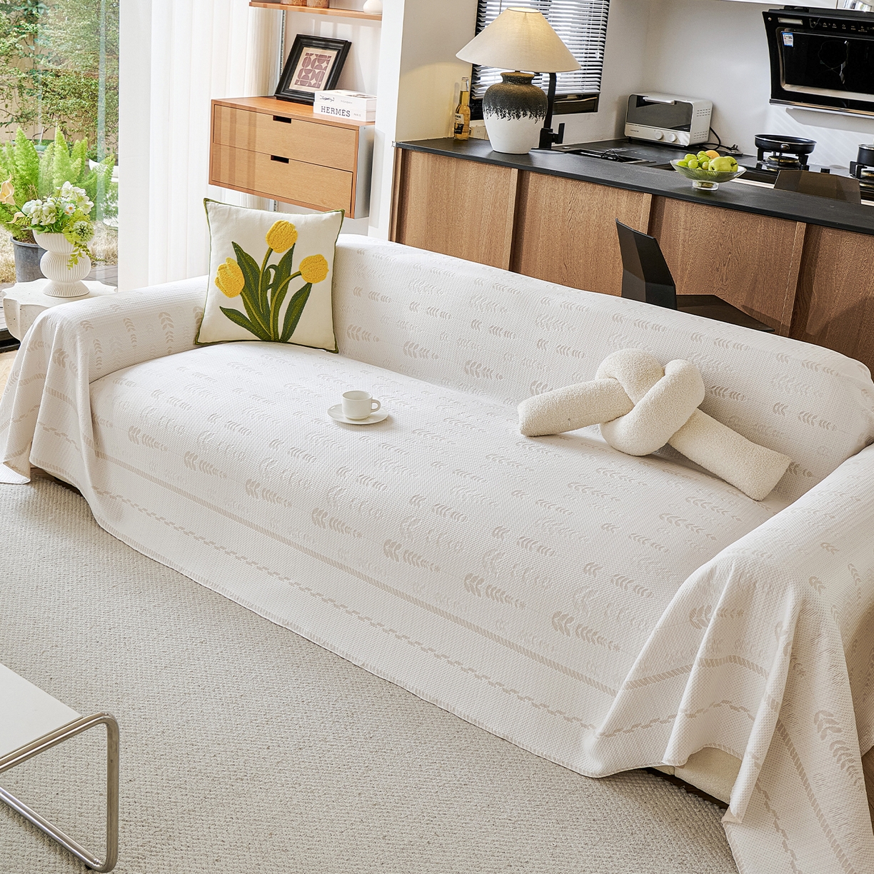 91家纺网 家纺一手货源 找家纺 卡初家居（原微来） 2026新款PE凉感冰丝沙发盖毯沙发巾系列 木槿-米