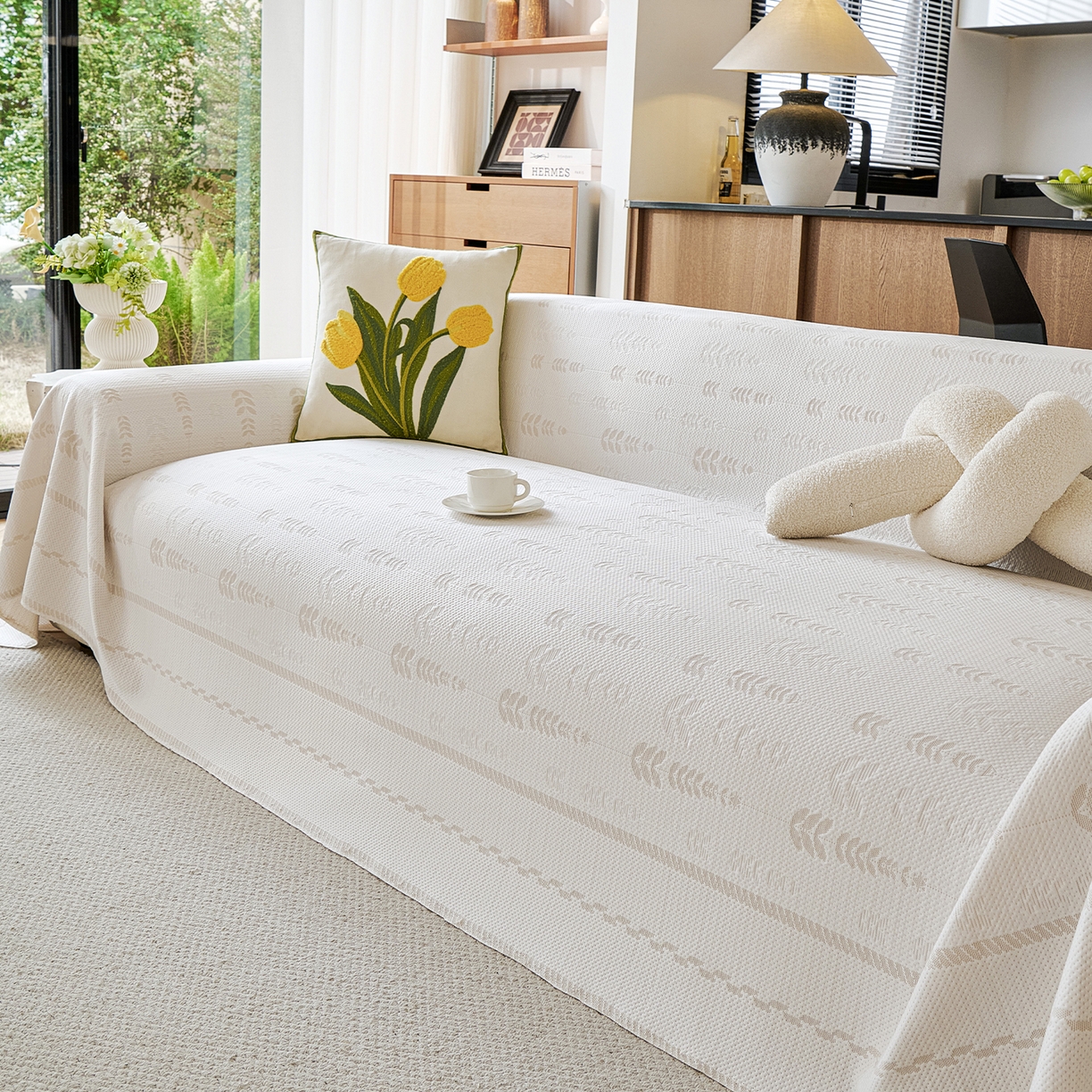 91家纺网 家纺一手货源 找家纺 卡初家居（原微来） 2026新款PE凉感冰丝沙发盖毯沙发巾系列 木槿-米