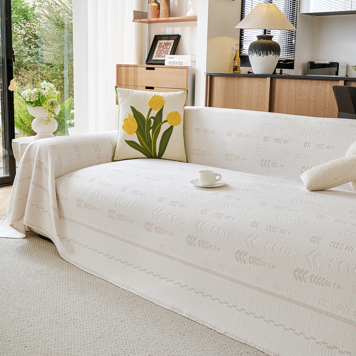 91家纺网 家纺一手货源 找家纺 卡初家居（原微来） 2026新款PE凉感冰丝沙发盖毯沙发巾系列 木槿-米