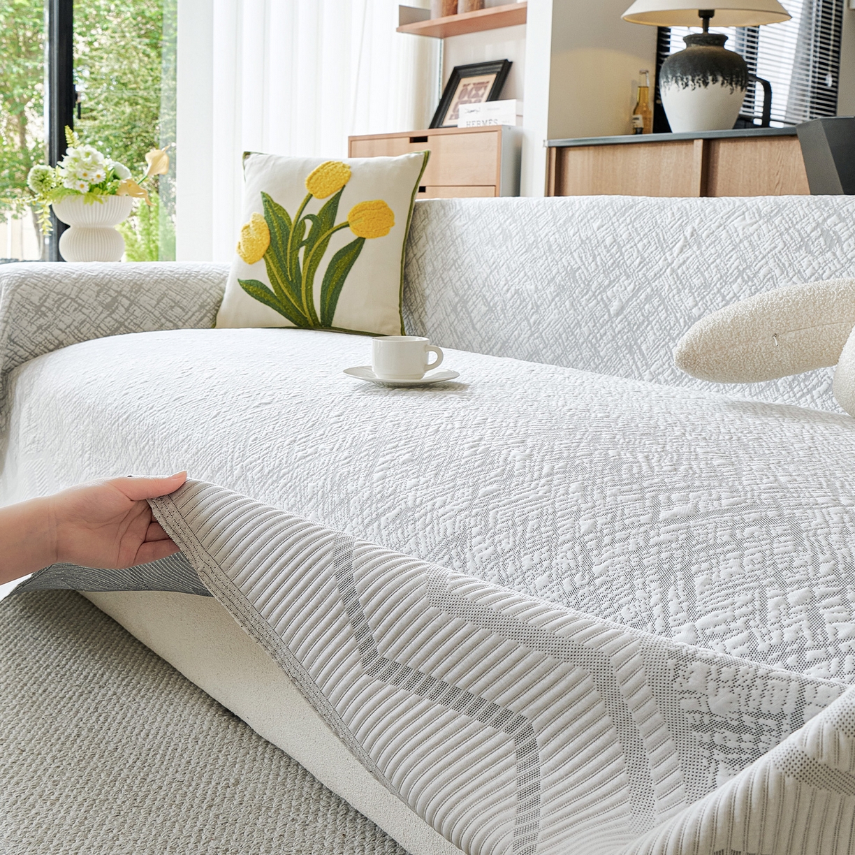 91家纺网 家纺一手货源 找家纺 卡初家居（原微来） 2026新款PE凉感冰丝沙发盖毯沙发巾系列 依恋-灰