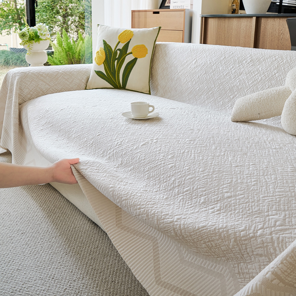 91家纺网 家纺一手货源 找家纺 卡初家居（原微来） 2026新款PE凉感冰丝沙发盖毯沙发巾系列 依恋-米