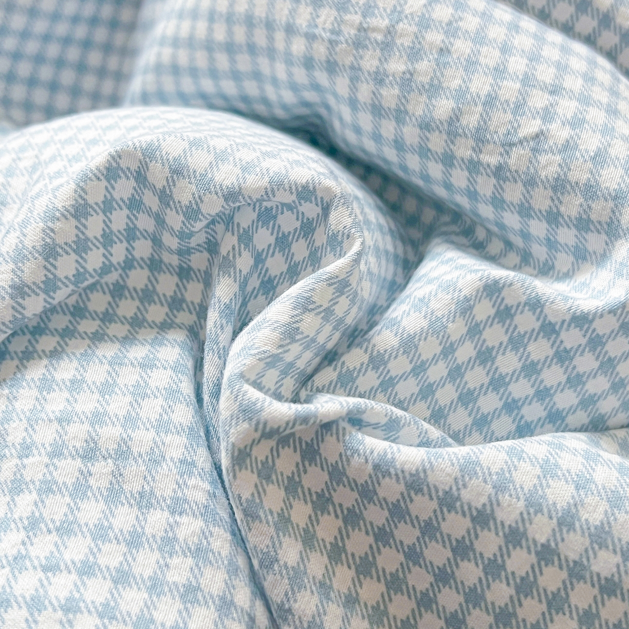 91家纺网 家纺一手货源 找家纺 古本家居 2026新款四季款水洗曲奇抱枕被 四季水洗曲奇蓝格