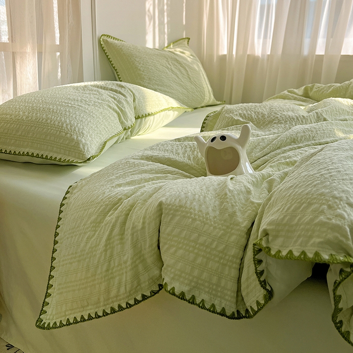 91家纺网 家纺一手货源 找家纺 仟网汇 2026新款泡泡纱三角针四件套--纯色系列 抹茶绿