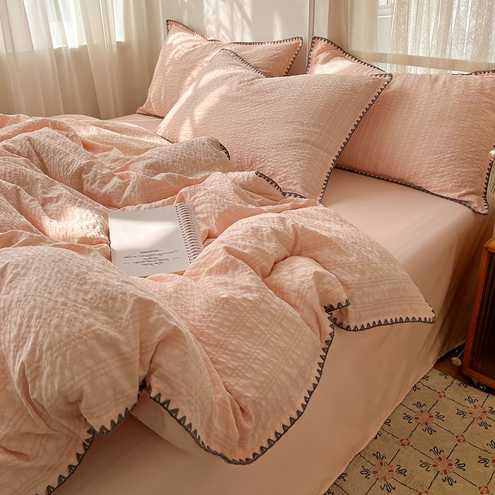 91家纺网 家纺一手货源 找家纺 仟网汇 2026新款泡泡纱三角针四件套--纯色系列 奶油粉