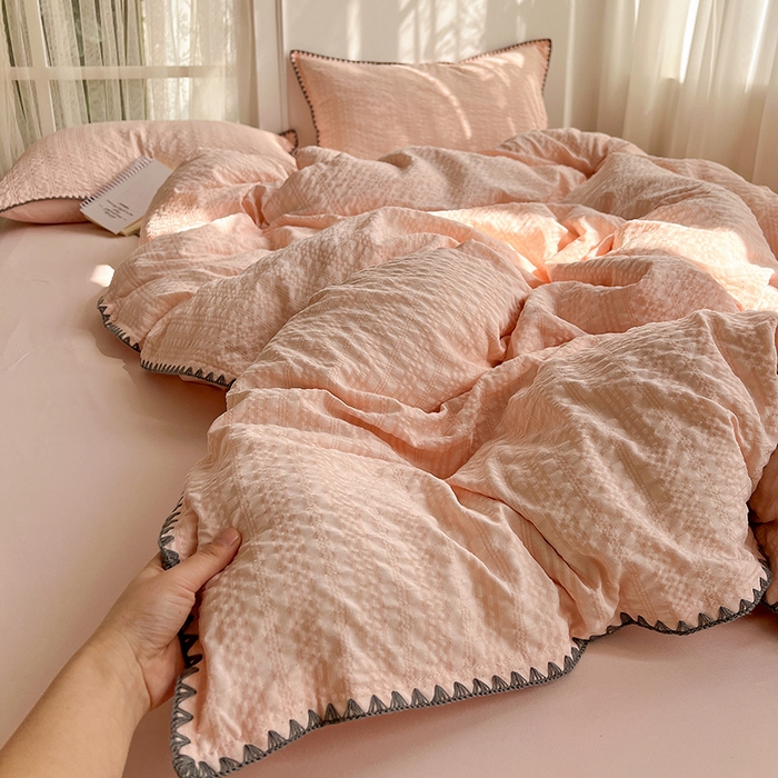 91家纺网 家纺一手货源 找家纺 仟网汇 2026新款泡泡纱三角针四件套--纯色系列 奶油粉