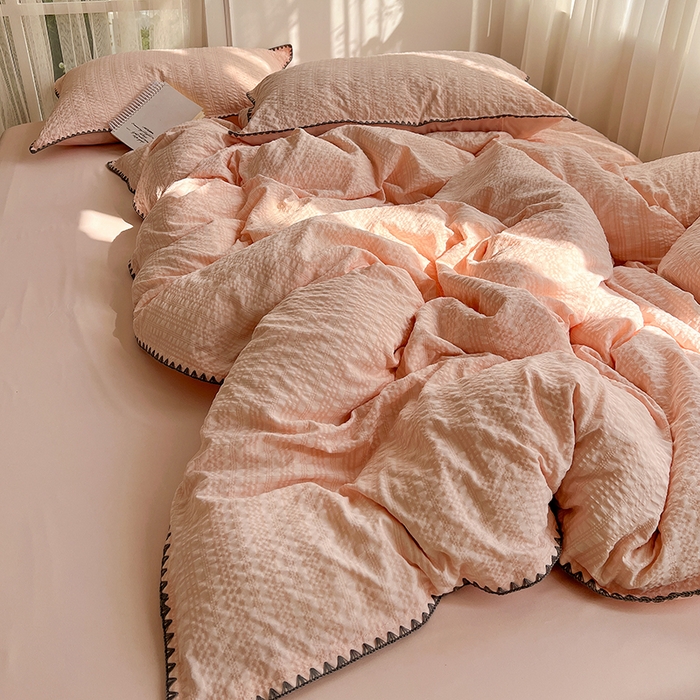 91家纺网 家纺一手货源 找家纺 仟网汇 2026新款泡泡纱三角针四件套--纯色系列 奶油粉