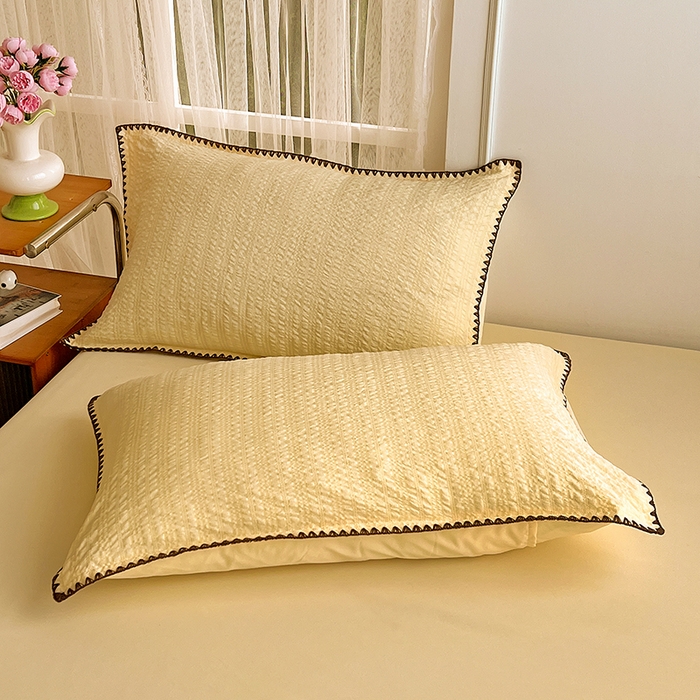 91家纺网 家纺一手货源 找家纺 仟网汇 2026新款泡泡纱三角针四件套--纯色系列 奶油黄