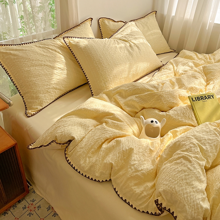 91家纺网 家纺一手货源 找家纺 仟网汇 2026新款泡泡纱三角针四件套--纯色系列 奶油黄