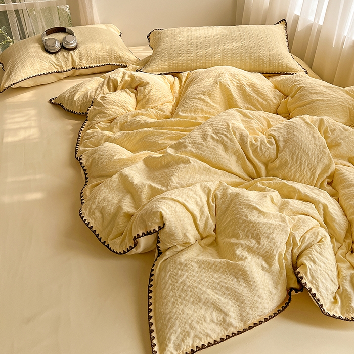 91家纺网 家纺一手货源 找家纺 仟网汇 2026新款泡泡纱三角针四件套--纯色系列 奶油黄