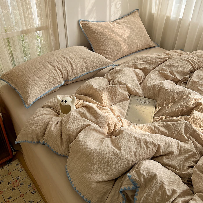 91家纺网 家纺一手货源 找家纺 仟网汇 2026新款泡泡纱三角针四件套--纯色系列 燕麦咖