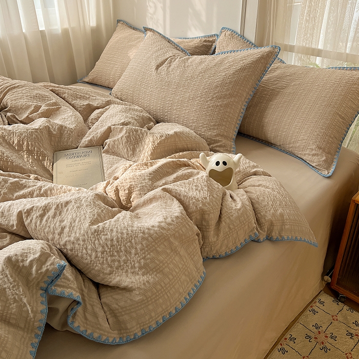 91家纺网 家纺一手货源 找家纺 仟网汇 2026新款泡泡纱三角针四件套--纯色系列 燕麦咖