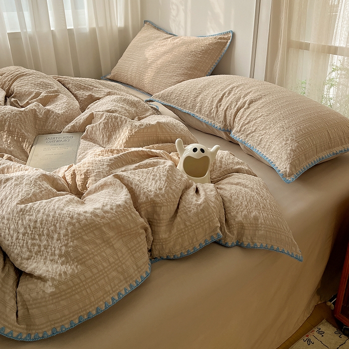 91家纺网 家纺一手货源 找家纺 仟网汇 2026新款泡泡纱三角针四件套--纯色系列 燕麦咖