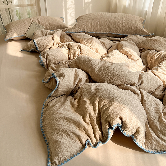 91家纺网 家纺一手货源 找家纺 仟网汇 2026新款泡泡纱三角针四件套--纯色系列 燕麦咖