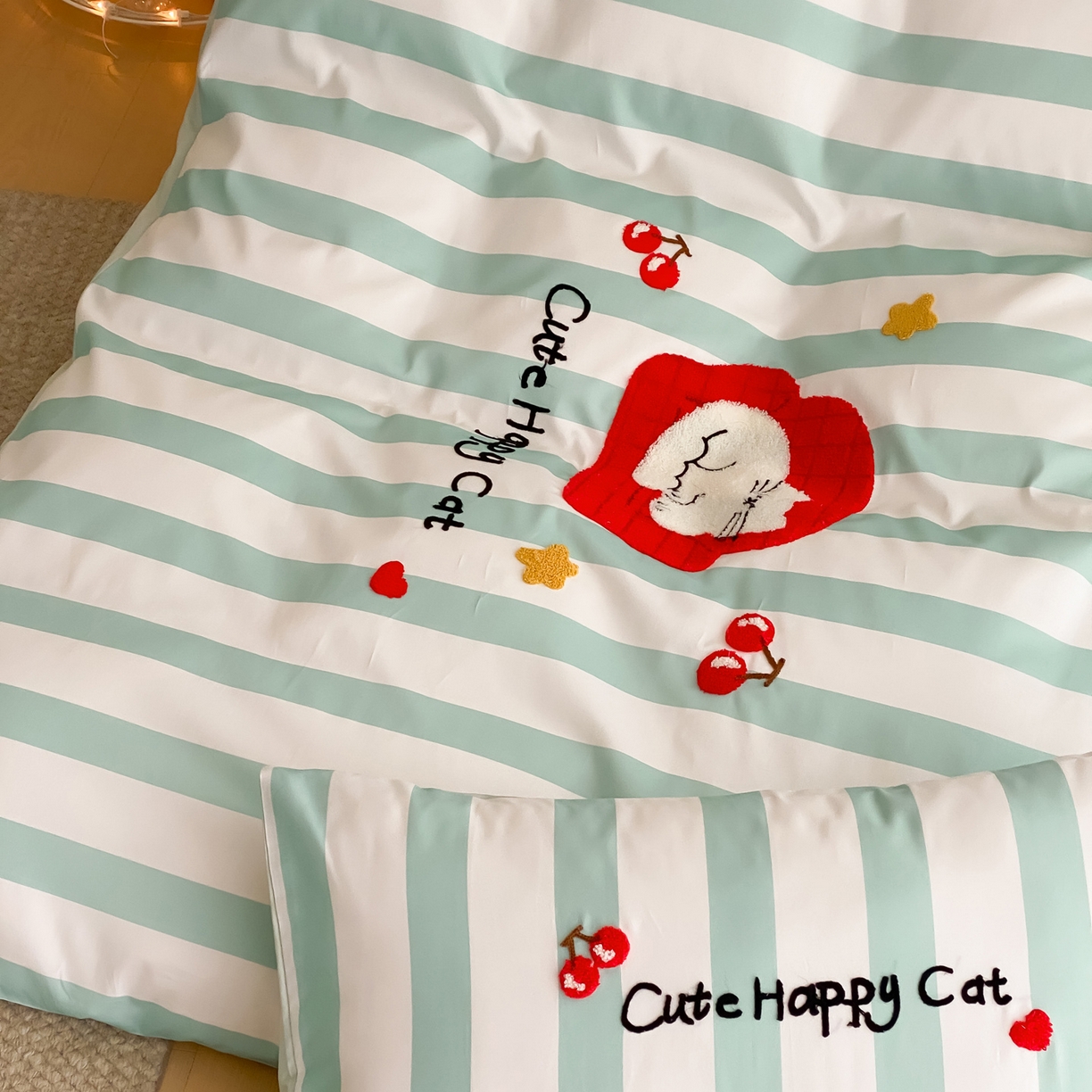 91家纺网 家纺一手货源 找家纺 如一 2026新款50S数码全棉长绒棉纯棉毛巾绣四件套 沙发猫