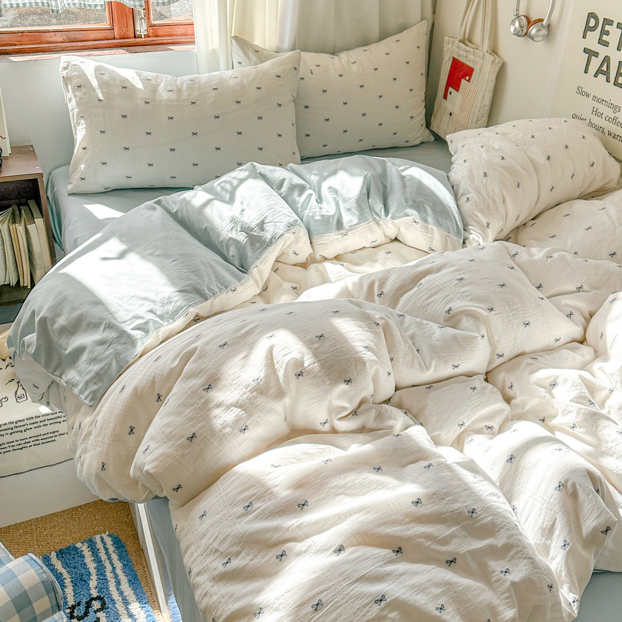 91家纺网 家纺一手货源 找家纺 田野 2026新款水洗棉提花人字小清新系列四件套 雾蓝蝴蝶结