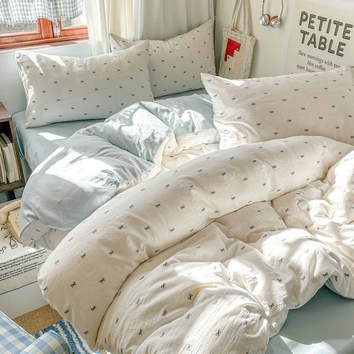 91家纺网 家纺一手货源 找家纺 田野 2026新款水洗棉提花人字小清新系列四件套 雾蓝蝴蝶结