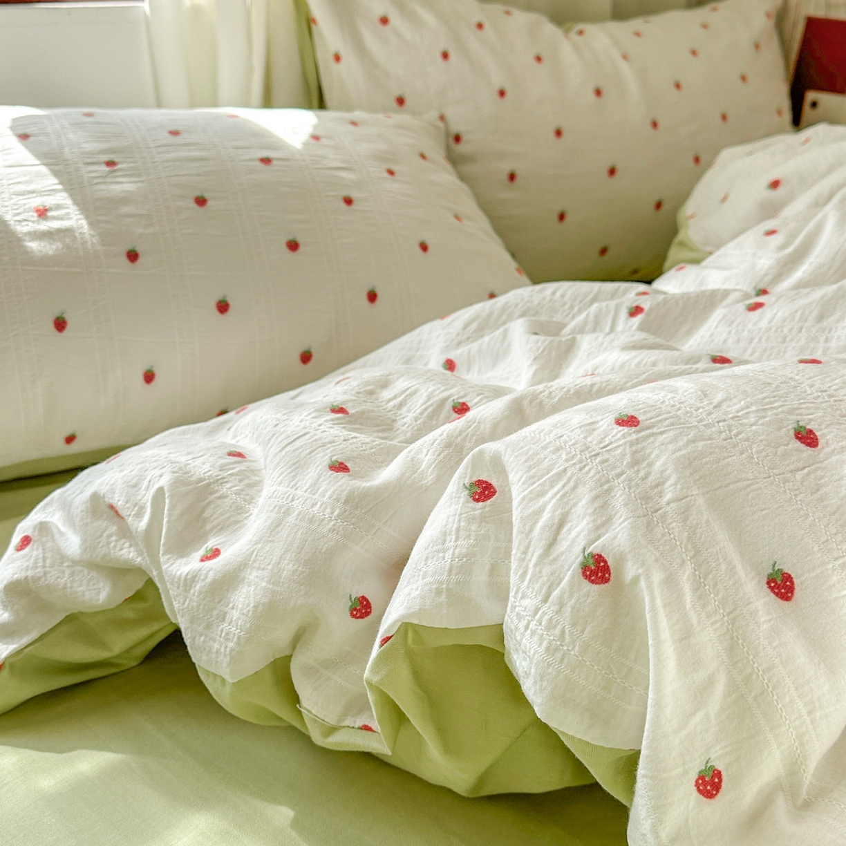 91家纺网 家纺一手货源 找家纺 田野 2026新款水洗棉提花人字小清新系列四件套 草莓奶绿