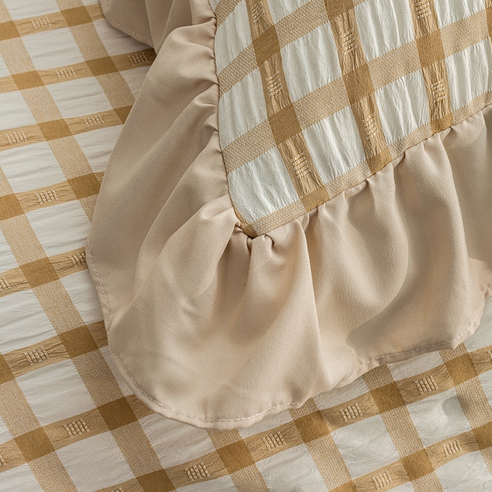 91家纺网 家纺一手货源 找家纺 恩和家纺 2026新款格子泡泡纱荷叶边四件套床单款床裙款套件 窗格花驼色