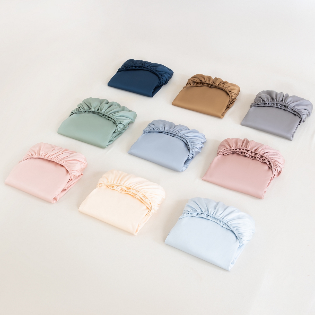 91家纺网 家纺一手货源 找家纺 眠博士 2026新款60S天丝莱赛尔纯色床笠-场景二 叠拍组合图-60S天丝