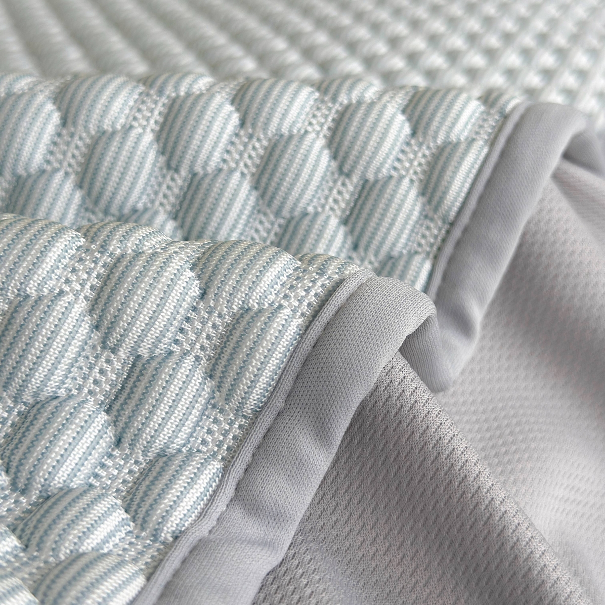 91家纺网 家纺一手货源 找家纺 禧禾 2026新款高冰感豆豆太空席 潘达蓝-床笠款