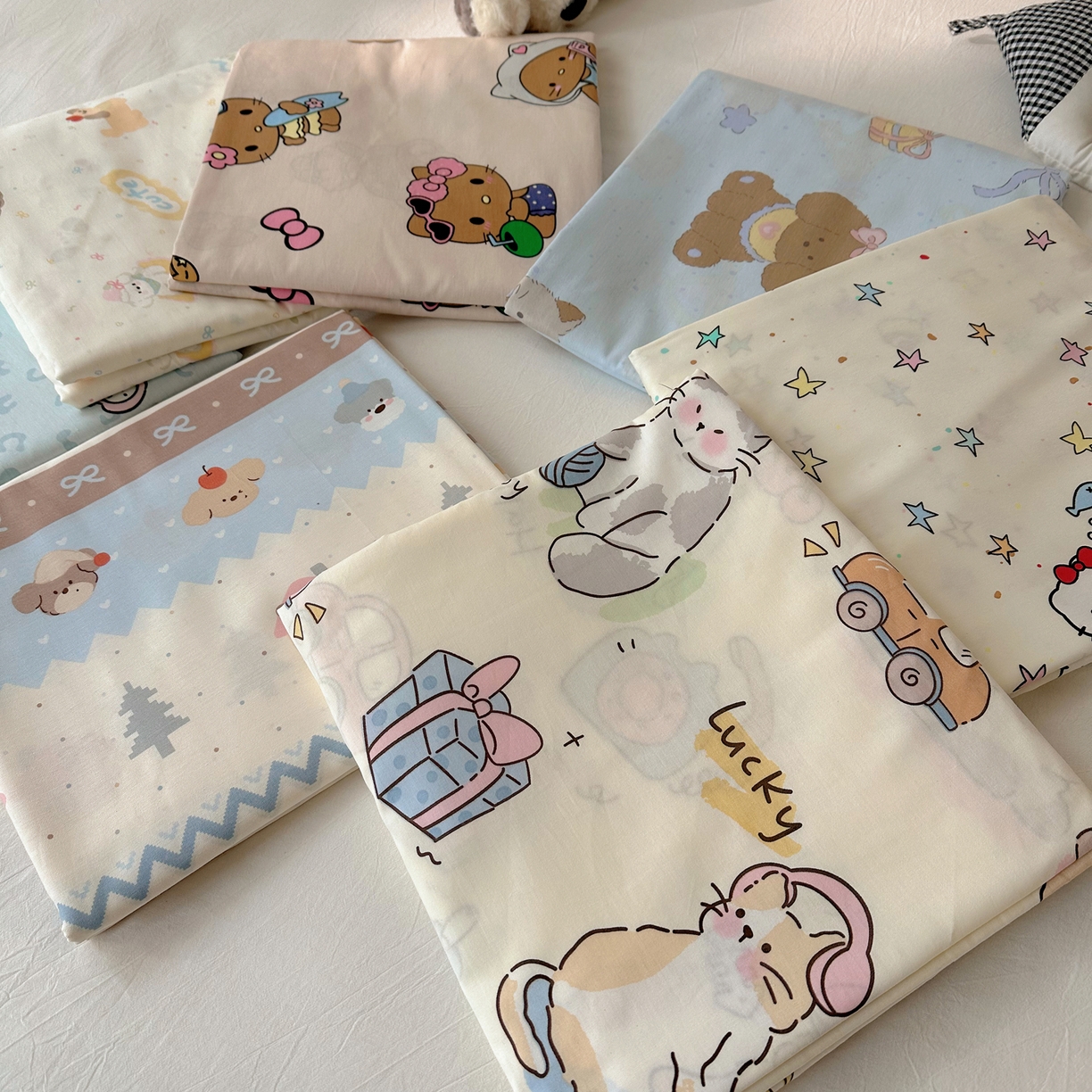 91家纺网 家纺一手货源 找家纺 六巷胡同 2026新款40支全棉13070INS卡通全棉单品床单 组合叠拍图