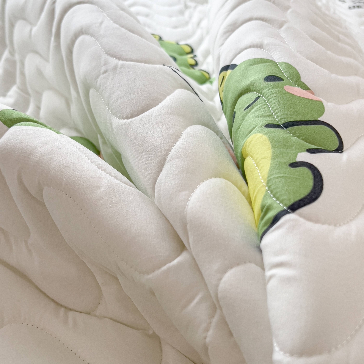 91家纺网 家纺一手货源 找家纺 希廷顿 2026新款印花夹棉防水床垫 小恐龙