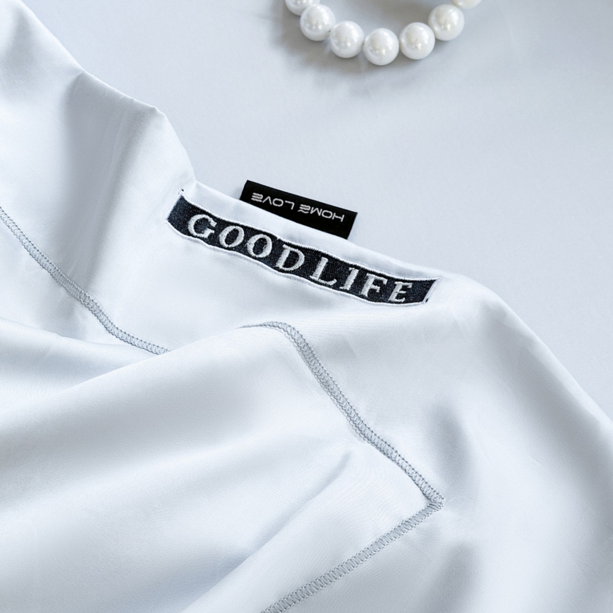 91家纺网 家纺一手货源 找家纺 （总）芯丝路家纺 2026新款进口天丝棉纯色绣花四件套(宽边一字绣工艺款）-可奈朵