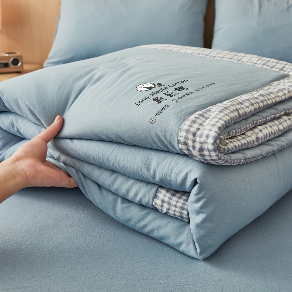 91家纺网 家纺一手货源 找家纺 鸣创 2026新款棉花夏被无印风100%新疆棉花夏凉被手包边空调被 新疆棉-蓝色
