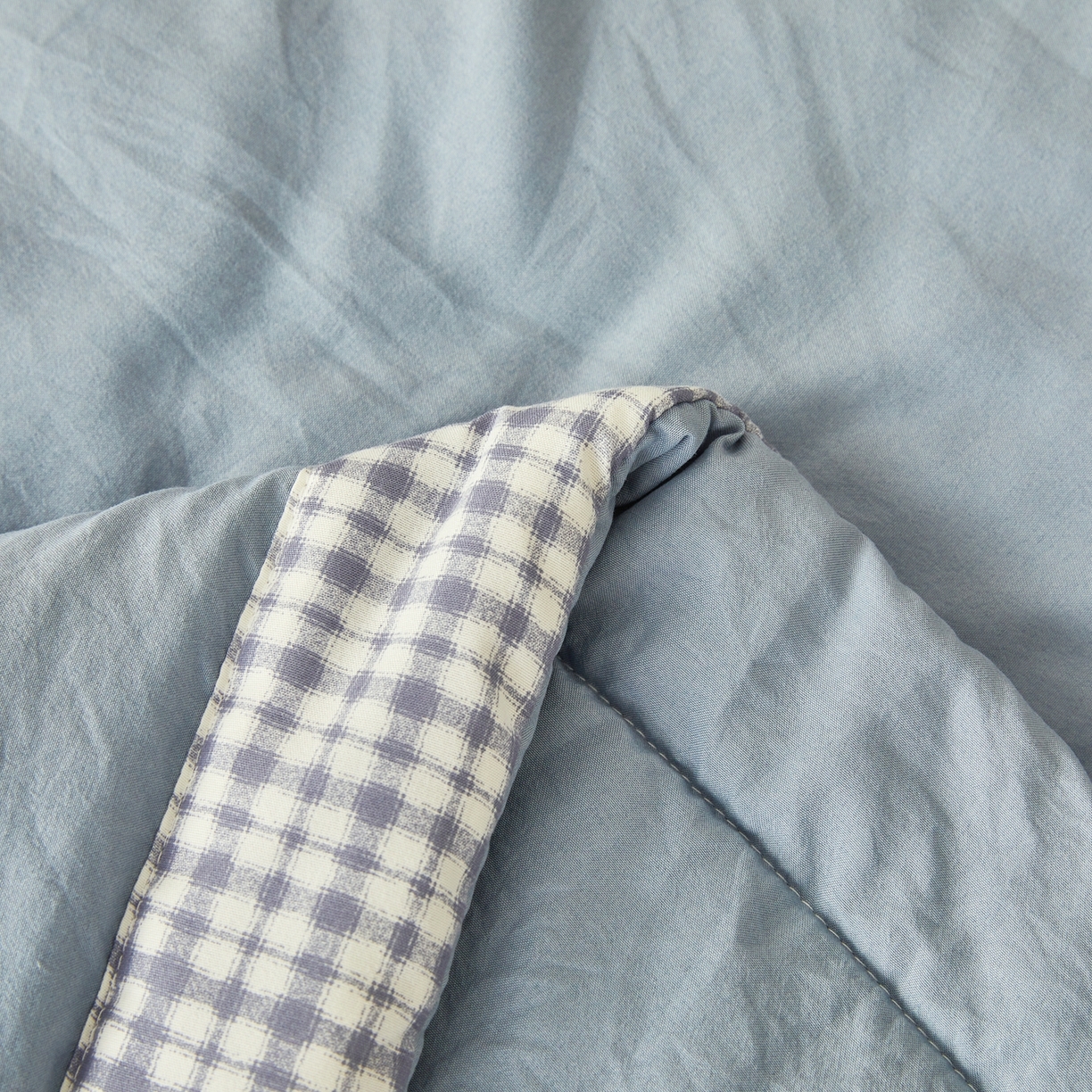 91家纺网 家纺一手货源 找家纺 鸣创 2026新款棉花夏被无印风100%新疆棉花夏凉被手包边空调被 新疆棉-蓝色