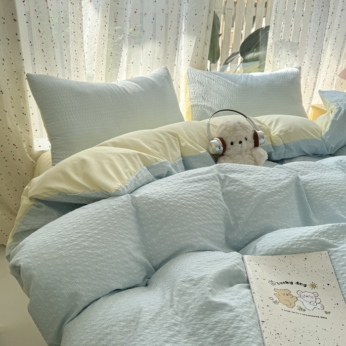 91家纺网 家纺一手货源 找家纺 雨帆家纺 2026新款时尚双拼泡芙纱四件套系列 泡芙纱蓝+芝士