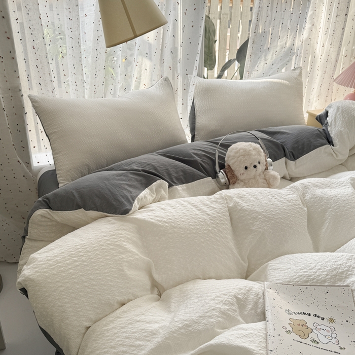 91家纺网 家纺一手货源 找家纺 雨帆家纺 2026新款时尚双拼泡芙纱四件套系列 泡芙纱米白+灰