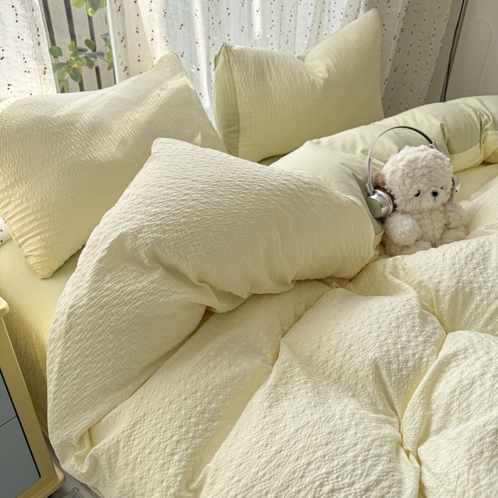 91家纺网 家纺一手货源 找家纺 雨帆家纺 2026新款时尚双拼泡芙纱四件套系列 泡芙纱米黄+绿