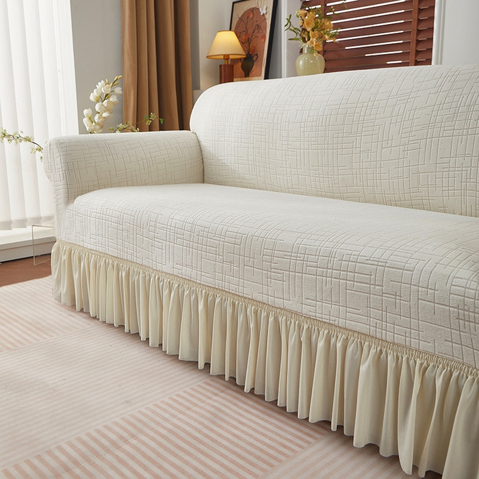 91家纺网 家纺一手货源 找家纺 飞翔家纺沙发套 2026新款素格纹裙摆沙发套 米白色