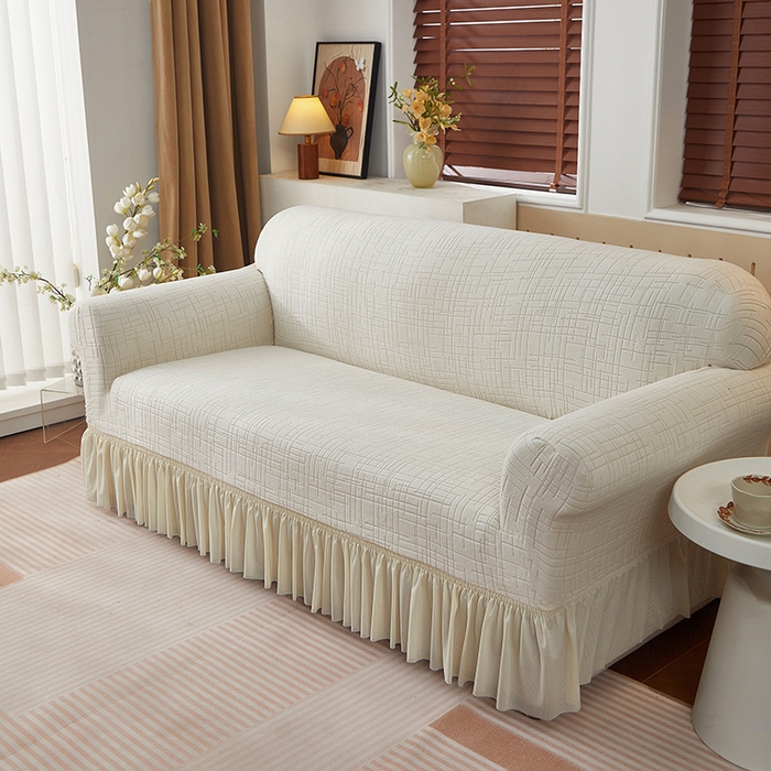 91家纺网 家纺一手货源 找家纺 飞翔家纺沙发套 2026新款素格纹裙摆沙发套 米白色