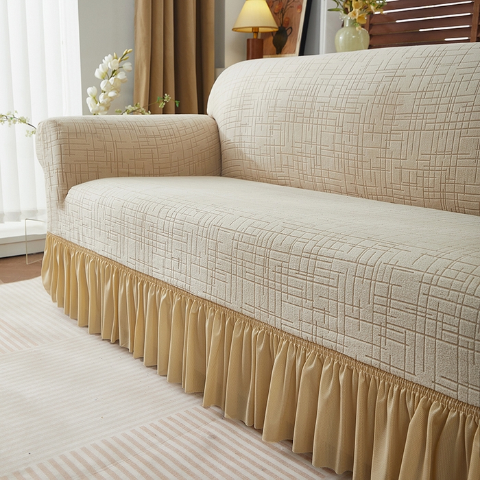 91家纺网 家纺一手货源 找家纺 飞翔家纺沙发套 2026新款素格纹裙摆沙发套 米黄色
