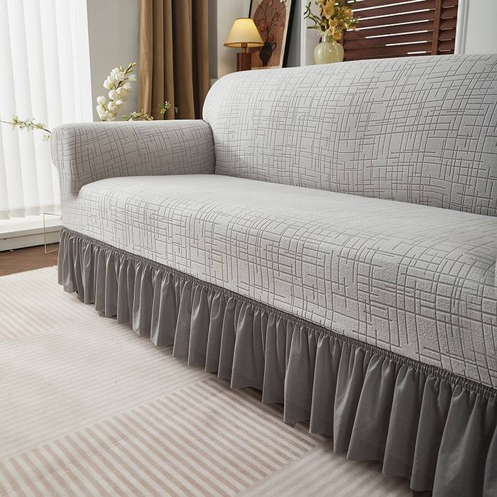 91家纺网 家纺一手货源 找家纺 飞翔家纺沙发套 2026新款素格纹裙摆沙发套 浅灰色