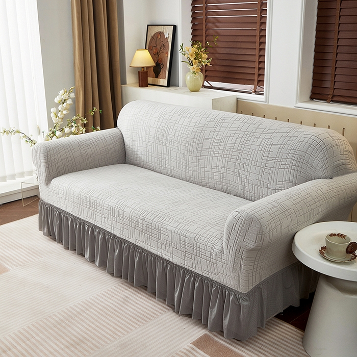 91家纺网 家纺一手货源 找家纺 飞翔家纺沙发套 2026新款素格纹裙摆沙发套 浅灰色