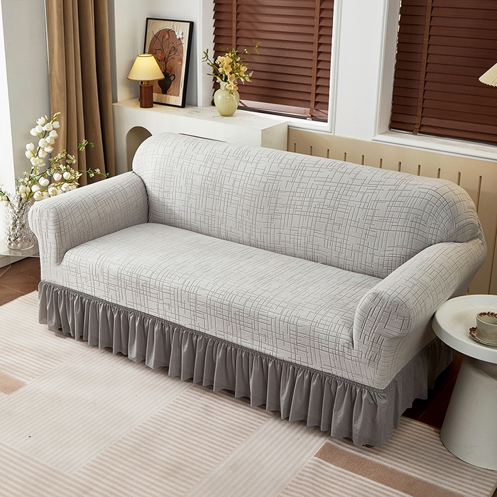 91家纺网 家纺一手货源 找家纺 飞翔家纺沙发套 2026新款素格纹裙摆沙发套 浅灰色