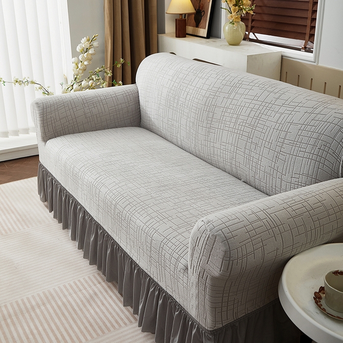 91家纺网 家纺一手货源 找家纺 飞翔家纺沙发套 2026新款素格纹裙摆沙发套 浅灰色